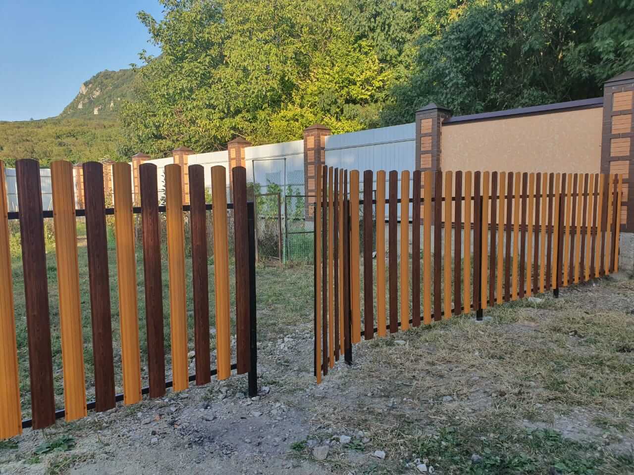Забор из евроштакетника 10м в двух цветах: Тик + Темное Дерево Printech фото 1 в Туркестане